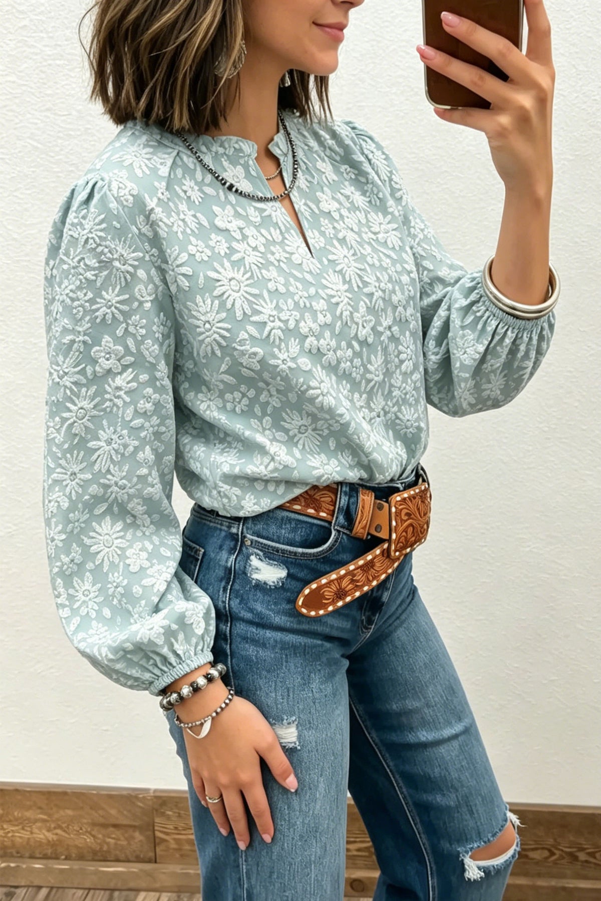 Blusa de flores en relieve