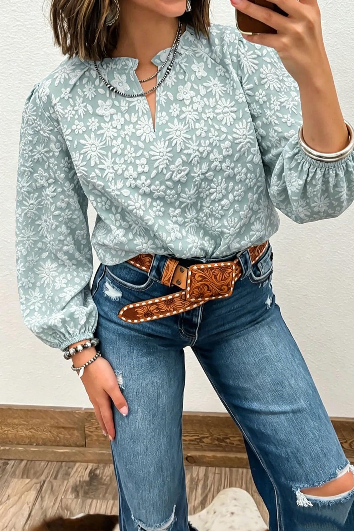 Blusa de flores en relieve