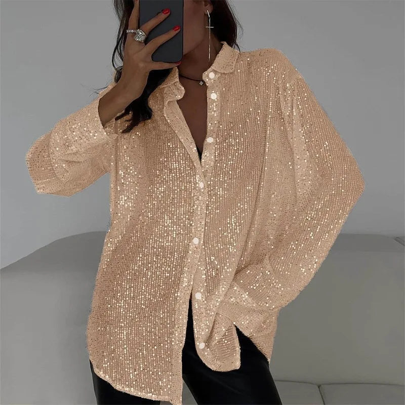 Camisa de lentejuelas de manga larga BB Bellezachic, blusa elegante con brillo, sobre fondo neutro y detalles de lentejuelas.