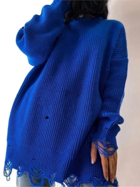Vestido largo de punto con efecto desgastado de la marca BB Bellezachic, muestra el tejido y el estilo casual del vestido.