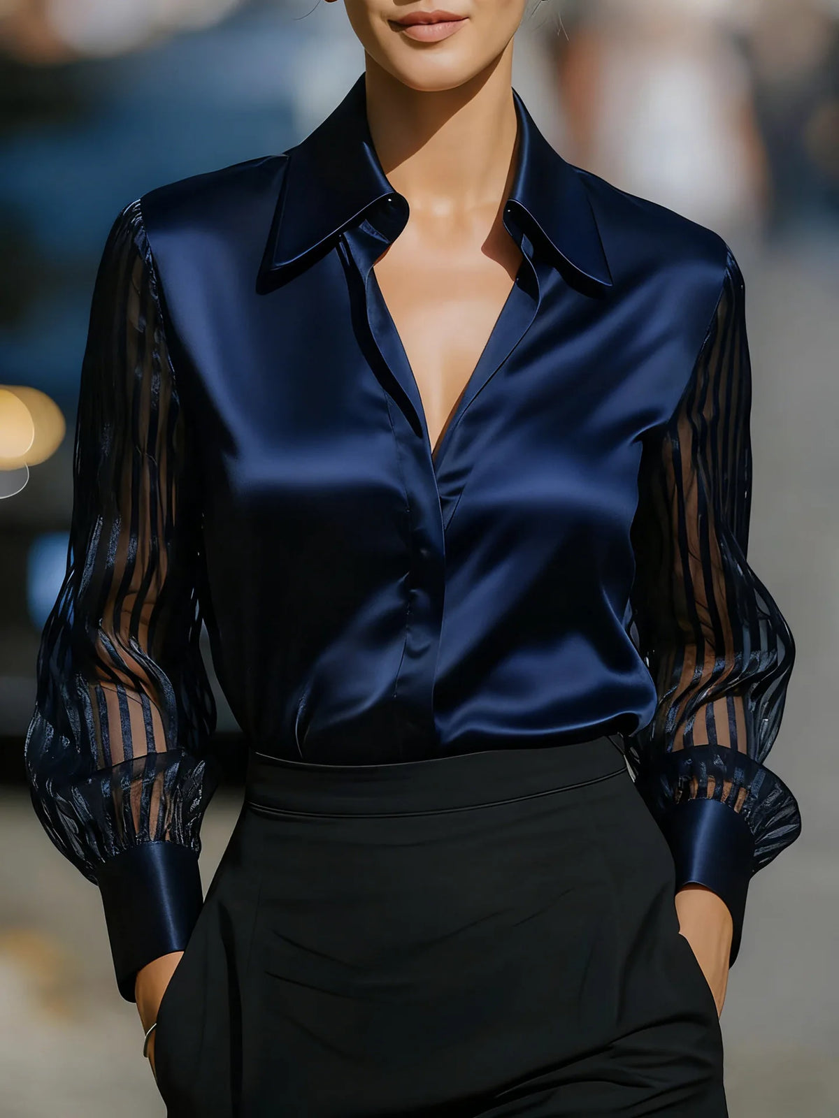 Camisa satinada de manga larga BB Bellezachic, blusa elegante con acabado brillante y estilo sofisticado, vista frontal.