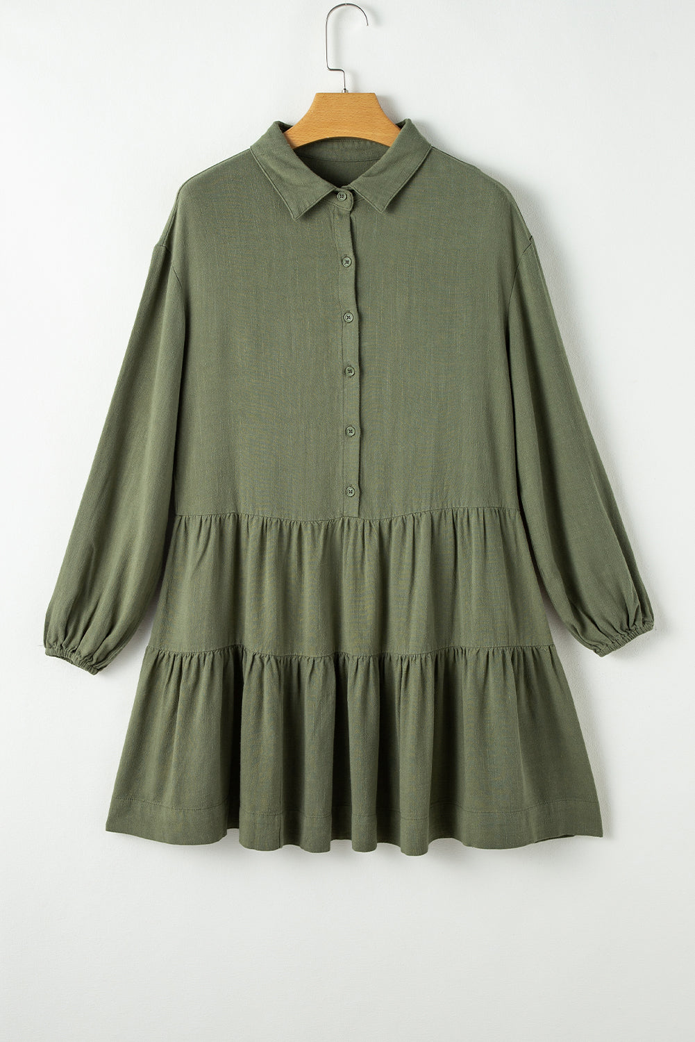 Vestido camisero verde con mangas abullonadas